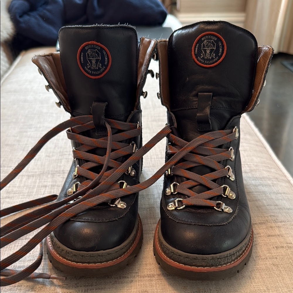 Black and Brown Lace-Up Boots
Not Available anymore